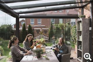 Wintergarten mit Ganzglasschiebeanlage